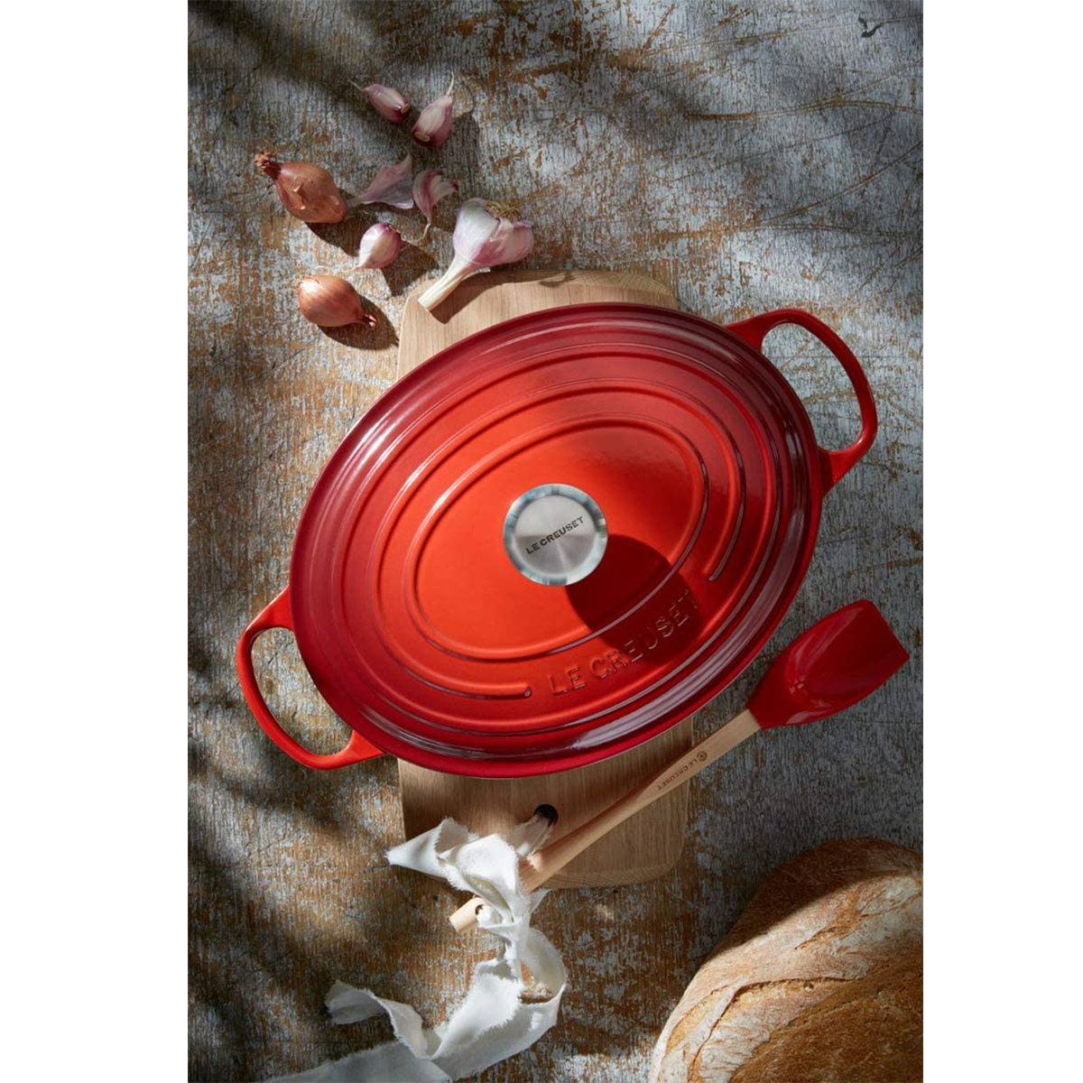 Cerise Red 6.75 quart Oval Dutch Oven Signature